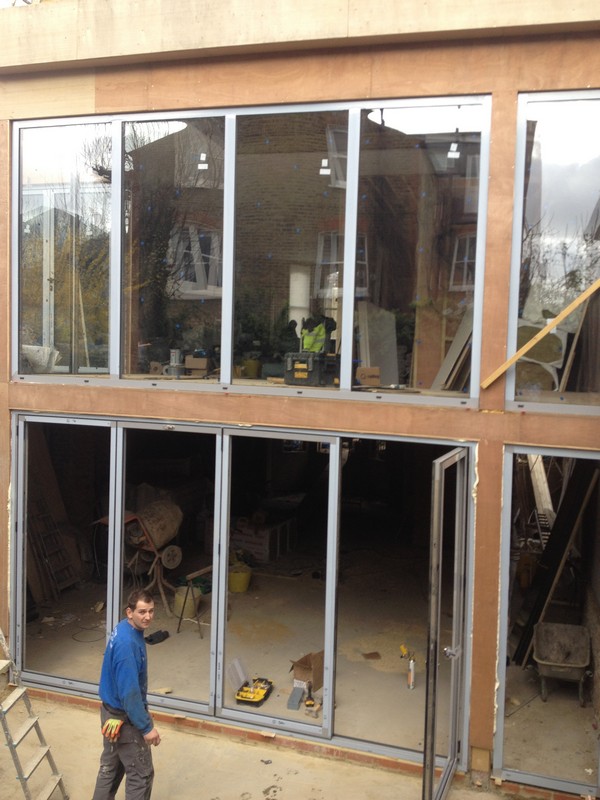 Aluminium bi-fold doors with two-storey glazing in Oxford
